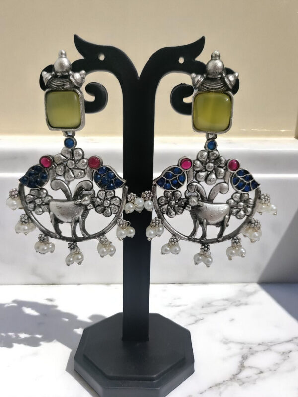 Yellow Nandi Oxidized Earrings with Floral Design